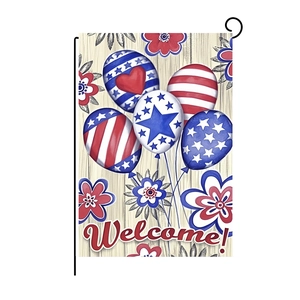 Outdoor American garden flag with patriotic balloons and Welcome text on a black metal stand