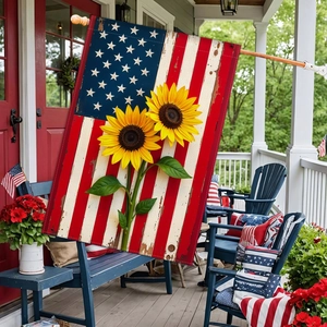 Detail of sunflower American flag garden flag on a porch with festive outdoor decor