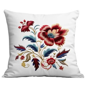 Close-up of intricate floral embroidery details on a white square pillow cover