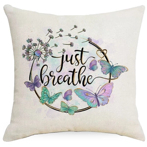 Linen cushion cover with dandelion floral pattern and just breathe butterfly print