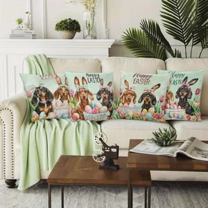 Detail of four Easter pillow covers with Dachshund dog and tulip designs on a white sofa