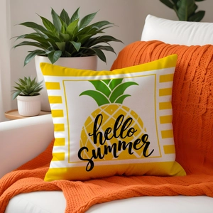 Summer pineapple print throw pillow cover with hello summer text on a white sofa