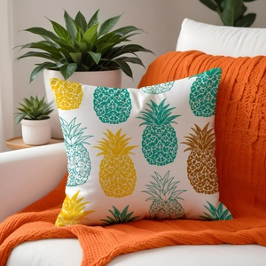 Decorative pillowcase with colorful pineapple prints on a textured linen-style fabric