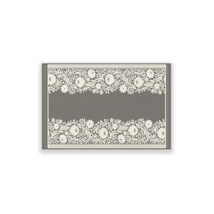 Close-up of bohemian table runner showing deep taupe fabric and white lace floral borders