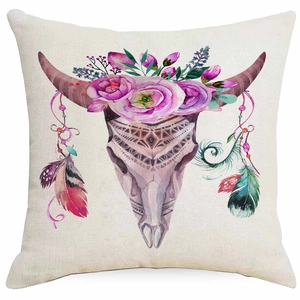 Detailed close-up of bohemian dreamcatcher cushion cover with watercolor bull skull pattern