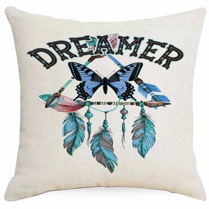 Detail of dreamcatcher pillow case showing vintage butterfly print and dreamer text