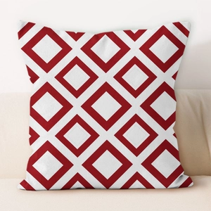 Detailed view of red and white geometric diamond pattern on high-quality square pillow case