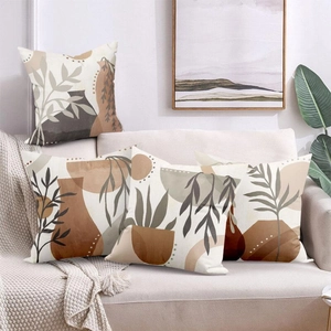 Set of 4 Nordic abstract floral cushion covers in Morandi earth tones on a beige sofa