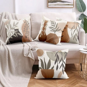 Set of 4 Nordic abstract floral pillow covers in Morandi tones on a cream sofa