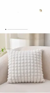 Detailed macro view of soft white faux rabbit fur fabric with checkered pattern texture
