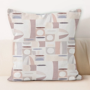 Detail of cream geometric cushion cover with Morandi abstract patterns on sofa