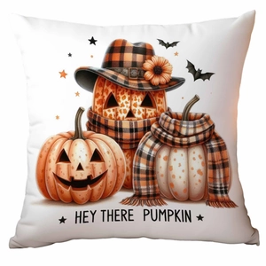 Detail of Halloween pumpkin print on pillowcase with Hey There Pumpkin text