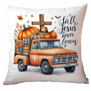 Detail of fall pumpkin cushion with vintage orange truck and religious autumn print