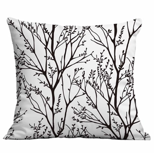 Vista dettagliata della federa quadrata con motivo botanico minimalista in bianco e nero