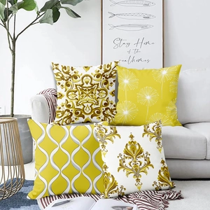 Nordic geometric throw pillow covers set with damask patterns on a white fabric sofa