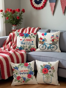 Detail of four linen Independence Day pillow covers with floral and patriotic designs