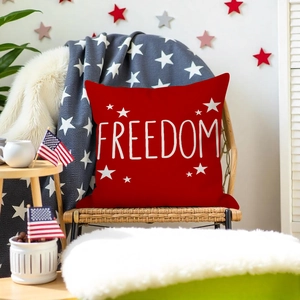 Detail view of red Independence Day pillowcase with white Freedom text and stars