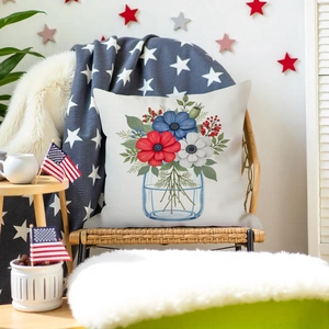 Detailed texture of linen flower pillowcase featuring red and blue floral print in a vase