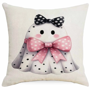 Close-up of Halloween ghost pillowcase showing linen texture and cute polka dot bow print