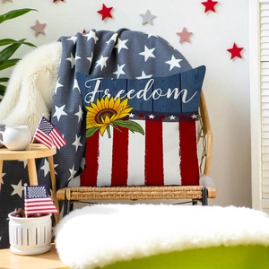 Detail of sunflower cushion cover with Freedom text and American flag style design