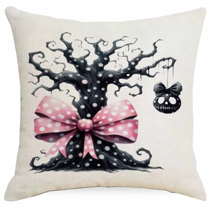 Close-up of Halloween pillow cover featuring a gothic black tree and pink polka dot bow