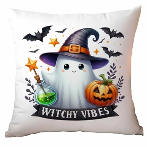 Close-up of linen pillowcase with cute ghost, pumpkin, and Witchy Vibes text