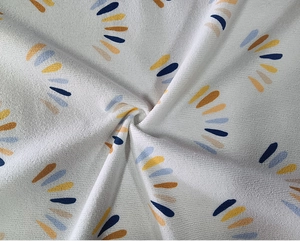 Detailed close-up showing the soft microfiber texture and vibrant printed wave pattern