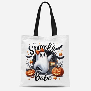 Détail d'un sac cabas en toile blanche avec imprimé fantôme Spooky Babe et anses noires