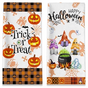 Λεπτομέρεια από πετσέτες μικροϊνών Halloween με νάνους κολοκύθες και εορταστικά σχέδια