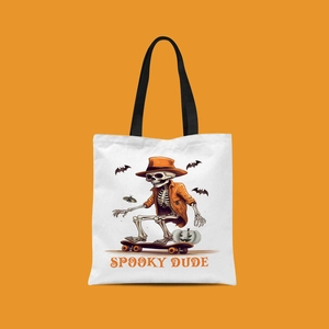 Detail of Halloween canvas tote bag with Spooky Dude skull print and black handles