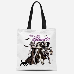White canvas tote bag featuring vintage Halloween witches print and black webbing handles