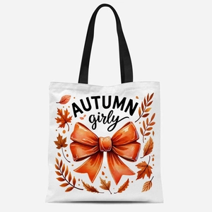 Détail du sac fourre-tout en toile avec imprimés de feuilles d'érable et citrouilles