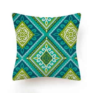 Square ethnic style cushion cover featuring blue and green geometric diamond pattern design