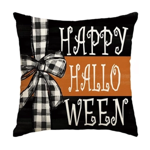 Detail of square Halloween pillowcase with Happy Halloween text and buffalo plaid bow