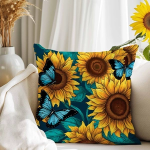 Luxuriöser Kissenbezug mit Sonnenblumen und Schmetterlingen auf einem hellen Sofa