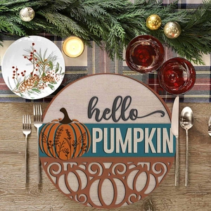 Close-up of linen round placemat with hello pumpkin text and unique cutout design