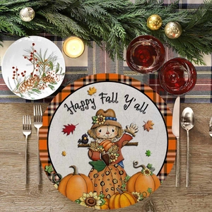 Fall harvest round linen placemat with scarecrow and pumpkin on a wooden table