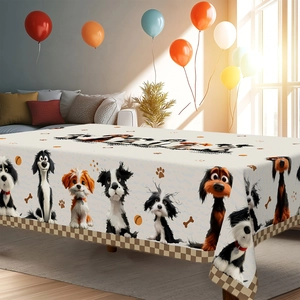 Detail view of rectangular dog print tablecloth with brown checkered edges and bone patterns