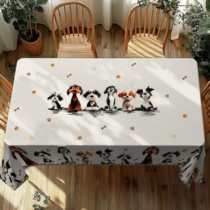 Detail of cartoon puppy pattern on rectangular tablecloth with natural wooden background