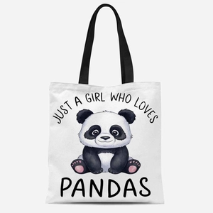 Close-up of cute panda print and Just A Girl Who Loves Pandas text on canvas tote bag