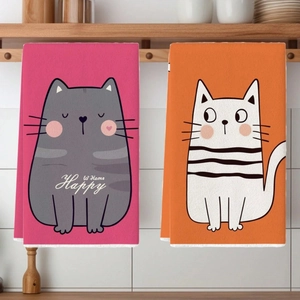 Set of two cute cat pattern microfiber kitchen towels in pink and orange hanging on rack