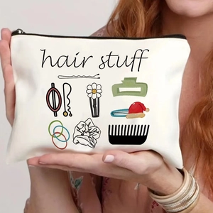 Borsa cosmetica in tela bianca con stampa hair stuff e illustrazioni di accessori