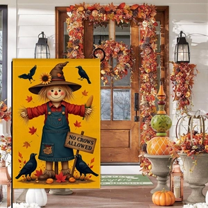 Vertical garden flag with scarecrow and autumn elements on a decorated home porch