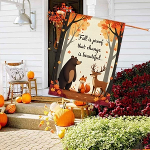 Detail of fall garden flag featuring forest animals and motivational autumn quote
