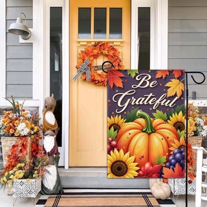 Be Grateful garden flag with pumpkin, sunflowers and maple leaves on home porch