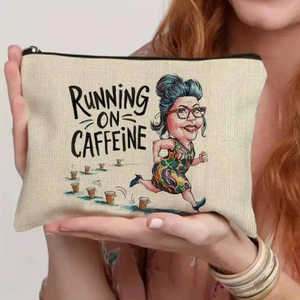 Detail of canvas makeup bag with humor slogan and black zipper held by model