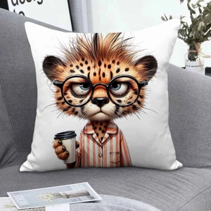 Close-up of cute cartoon cheetah pillow case with coffee and glasses on a gray sofa