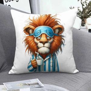 Detailed view of square pillowcase with cartoon lion print on a cozy grey sofa