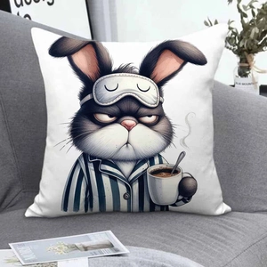 Detail of cute tired rabbit cushion cover on sofa showing high quality fabric texture