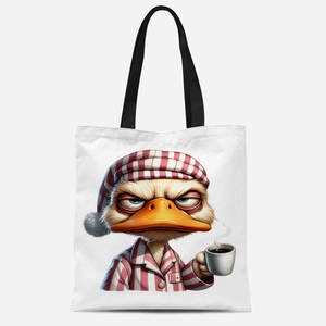 Détail du sac fourre-tout en toile blanche avec canard fatigué et sangle noire